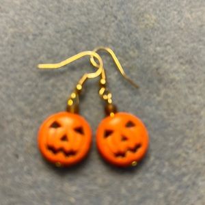 Gold tone jack-o-lantern earrings